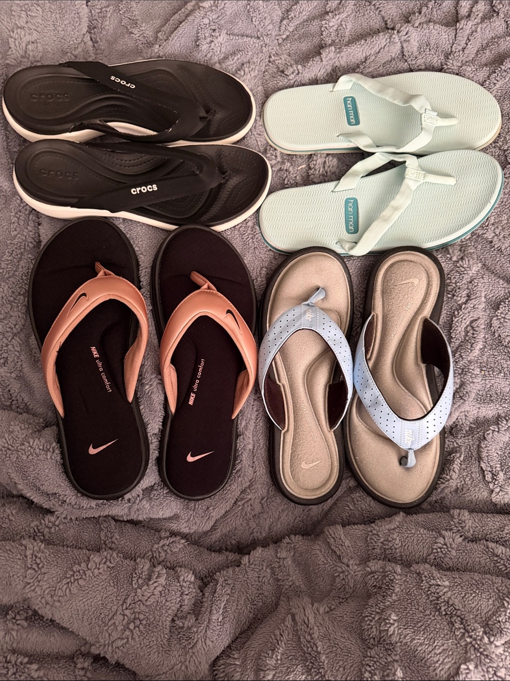 4 pairs of flip flops Nike croc and hari Mari